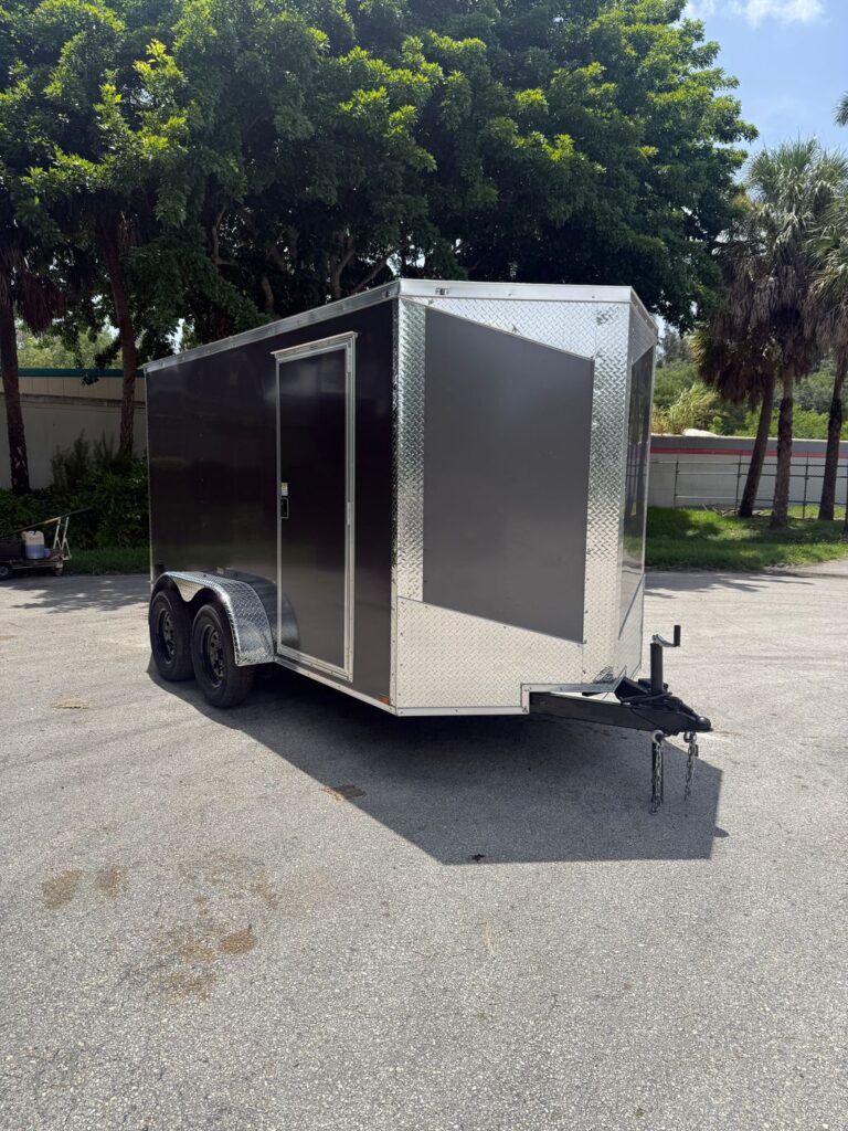Gray 2026 Hook and Line 6x12 enclosed cargo trailer with tandem axles and V-nose