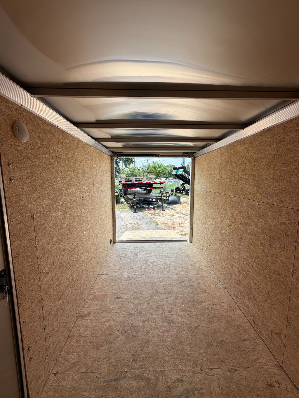 Alcom tandem axle cargo trailer interior and aluminum roof