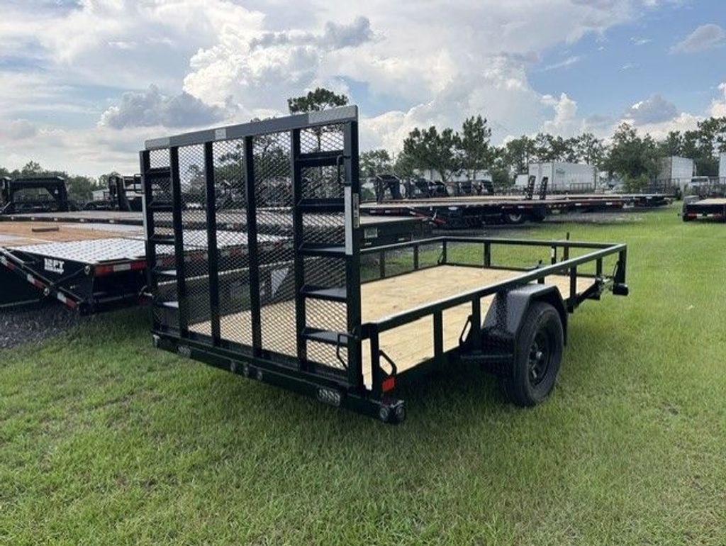 Load Trail 6.5x12 single axle utility stock 17801 rear quarter and open deck