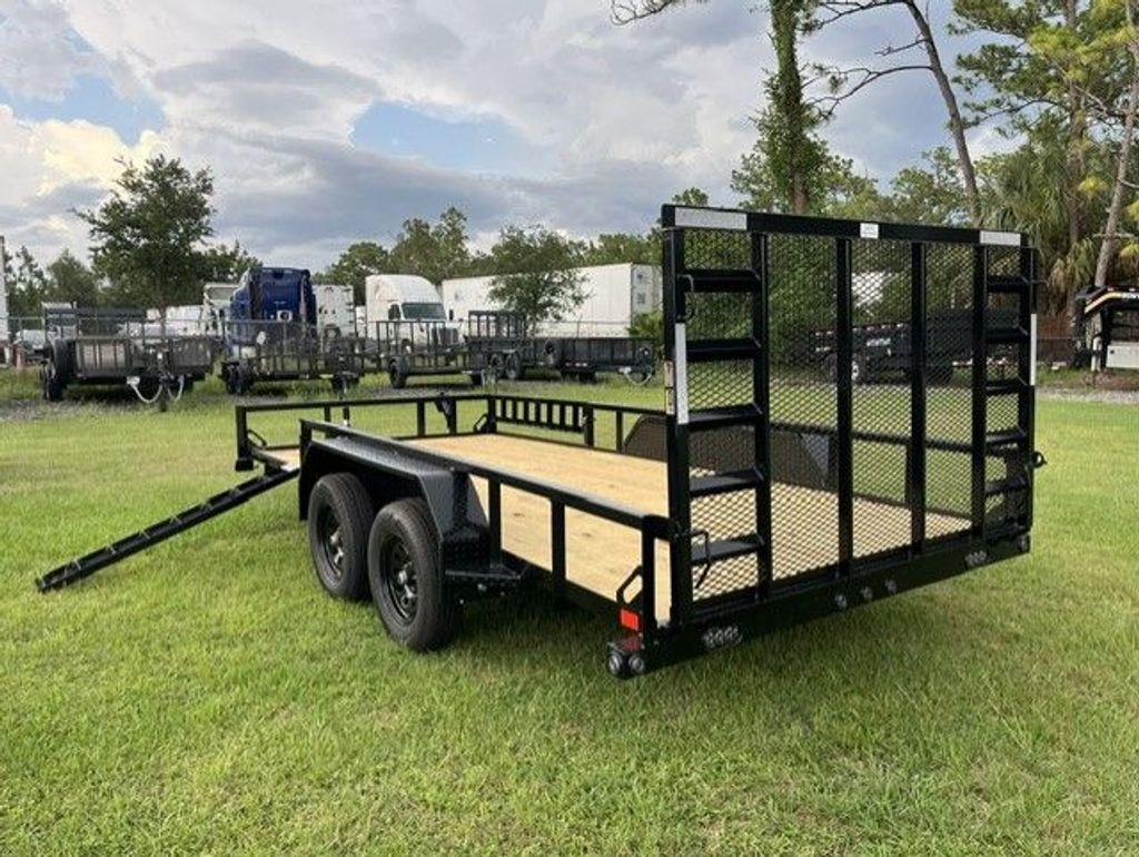 Load Trail 7x16 ATV utility trailer stock 17806 rear quarter with side ramp