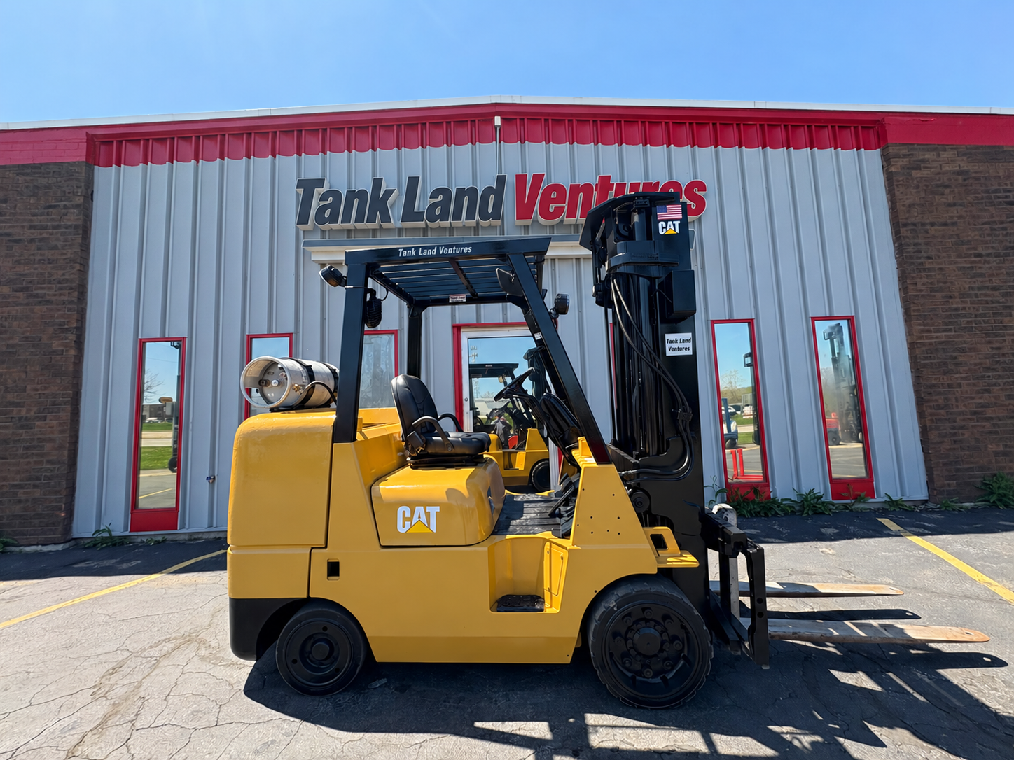 Full side view of 2008 CAT GC45KSWB forklift, stock 1625, with Tank Land Ventures branding